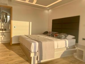 Postel nebo postele na pokoji v ubytování DIA suites collection + 14 fotografií