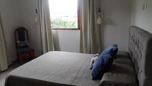 Postel nebo postele na pokoji v ubytování Cabañas Tafi