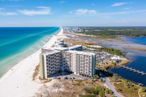 an aerial view of a resort on a beach at Sandy Bottoms PPC3 - 401! Gulf Front Views! in Panama City Beach