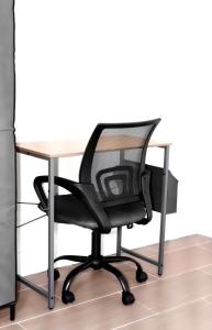 an office chair and a desk with a computer at Purple Serenity at Brooklyn in Brooklyn