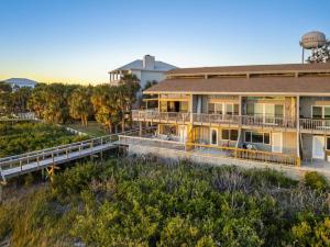an aerial view of a house with a deck at Cedar Tides in Cedar Key