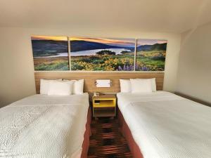 Postel nebo postele na pokoji v ubytování Days Inn by Wyndham Lumberton