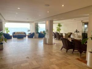 Istumisnurk majutusasutuses Costa Sur Resort, Classico Collection by Sonesta