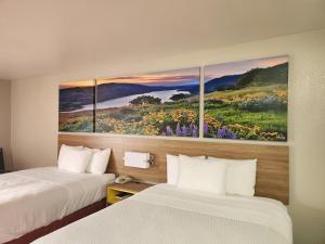 Postel nebo postele na pokoji v ubytování Days Inn by Wyndham Lumberton
