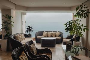 Istumisnurk majutusasutuses Costa Sur Resort, Classico Collection by Sonesta
