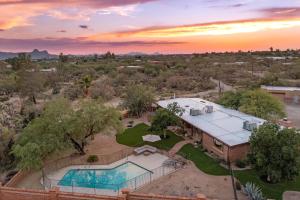 an aerial view of a house with a swimming pool at Rancho del Plata in Tucson