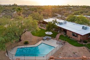 an aerial view of a house with a swimming pool at Hacienda del Plata in Tucson