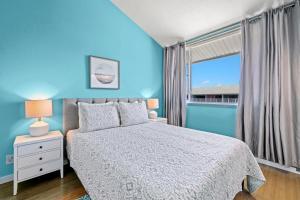Voodi või voodid majutusasutuse Salt Life Condo 2 - Endless Gulf views toas