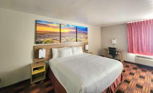 Postel nebo postele na pokoji v ubytování Days Inn by Wyndham Lumberton + 37 fotografií
