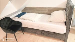 Postel nebo postele na pokoji v ubytování FMI28 Deluxe Studio-Apartments