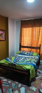Postel nebo postele na pokoji v ubytování Hotel Castillo Real