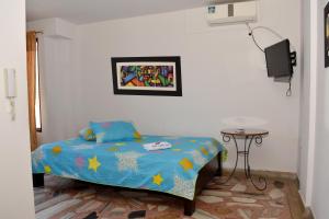 Postel nebo postele na pokoji v ubytování Hotel Castillo Real