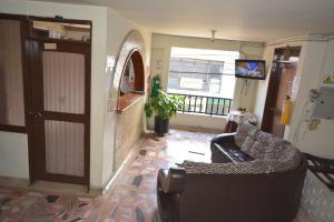 TV a/nebo společenská místnost v ubytování Hotel Castillo Real
