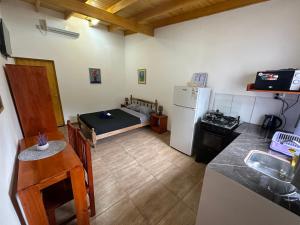 Kuchyň nebo kuchyňský kout v ubytování Paraiso Cataratas