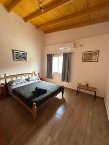 Postel nebo postele na pokoji v ubytování Paraiso Cataratas + 17 fotografií