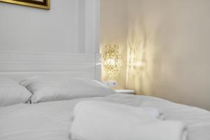Uma cama ou camas num quarto em Chateau Franz