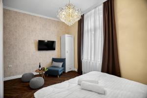 Uma cama ou camas num quarto em Chateau Franz
