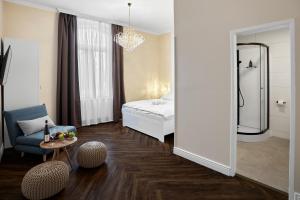 Uma cama ou camas num quarto em Chateau Franz