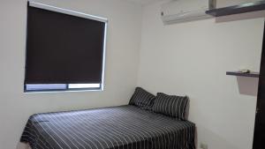 モンテレイにあるEverest 663の薄型テレビのある部屋の椅子 +16枚の写真