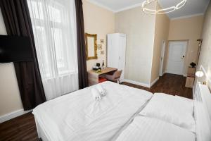 Uma cama ou camas num quarto em Chateau Franz