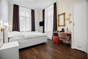 Uma cama ou camas num quarto em Chateau Franz
