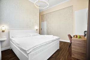 Uma cama ou camas num quarto em Chateau Franz
