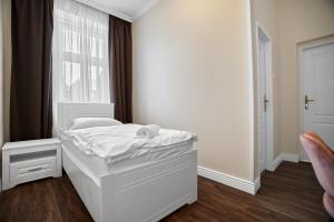 Uma cama ou camas num quarto em Chateau Franz