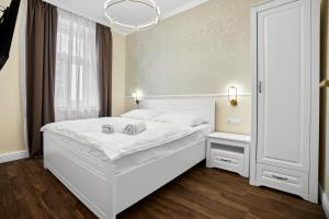 Uma cama ou camas num quarto em Chateau Franz
