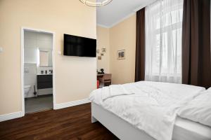 Uma cama ou camas num quarto em Chateau Franz
