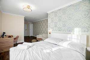 Uma cama ou camas num quarto em Chateau Franz
