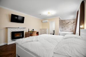 Uma cama ou camas num quarto em Chateau Franz