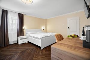 Uma cama ou camas num quarto em Chateau Franz