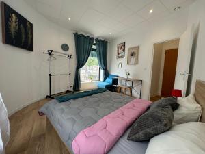 En eller flere senge i et værelse på Escale 2