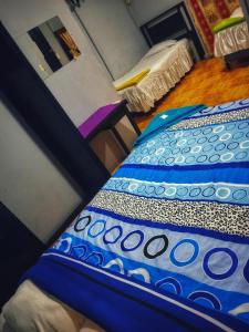 Voodi või voodid majutusasutuse Managua Hotel Oasis toas