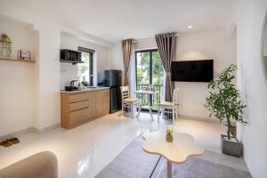 TV a/nebo společenská místnost v ubytování The Royal Sky - Phu My Hung + 15 fotografií