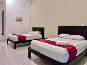 Postel nebo postele na pokoji v ubytování Casa Vidal Hotel