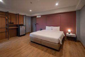 Postel nebo postele na pokoji v ubytování Lima Hotel + 37 fotografií