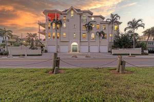 a large house with a fence in front of it at Admirals Watch - 673 in Siesta Key