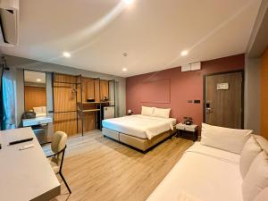 Postel nebo postele na pokoji v ubytování Lima Hotel