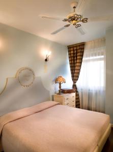 Posteľ alebo postele v izbe v ubytovaní Hotel Serenella