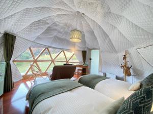 GRAND VERDE RESORT客房内的一张或多张床位