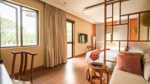 Ένα ή περισσότερα κρεβάτια σε δωμάτιο στο Sun Island Resorts, Shanghai +50 φωτογραφίες