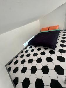 Ένα ή περισσότερα κρεβάτια σε δωμάτιο στο The home stay 1