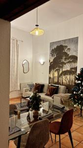 a living room with a couch and a table at Appartement centre historique in Tarascon