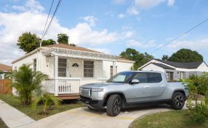 a white truck parked in front of a house at Casa MIA central location, free parking, fully equipped in Miami