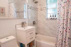 a bathroom with a sink and a toilet and a shower at Casa MIA central location, free parking, fully equipped in Miami +57 photos