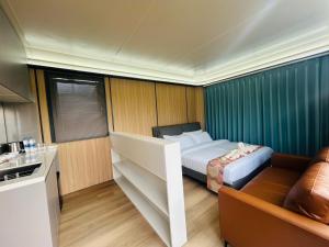 Postel nebo postele na pokoji v ubytování Space House Hotel Phuket + 54 fotografií