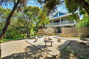 a house with a picnic table in front of it at Saltwood House NEW Listing in Gnarabup