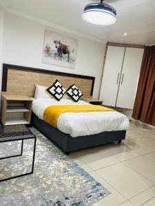 Postel nebo postele na pokoji v ubytování Legugu Bed and Breakfast