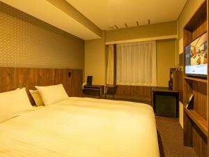 TV a/nebo společenská místnost v ubytování Hotel Odashima + 24 fotografií